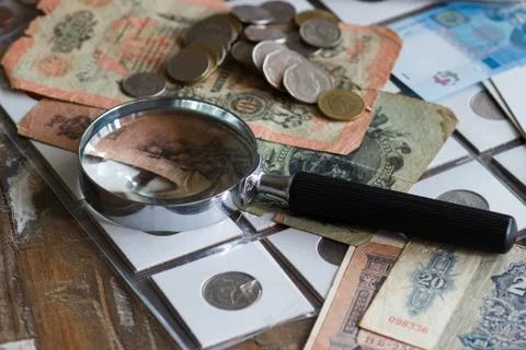 Background from different coins and old banknotes Stock Photos