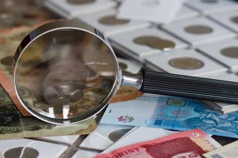 Background from different coins and old banknotes 库存照片