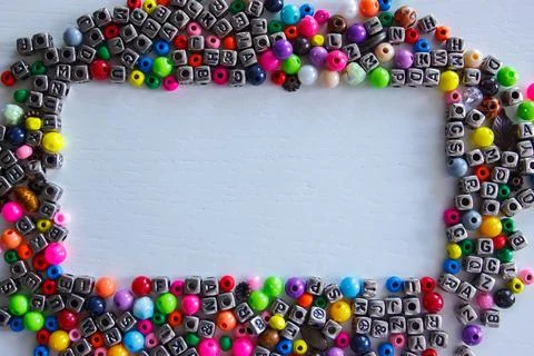 Background from different colored beads with numbers and symbols 写真素材