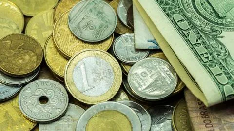 Background from different countries coins. Stock Photos