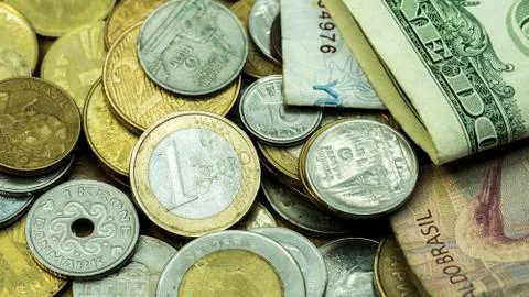 Background from different countries coins. Stock Photos