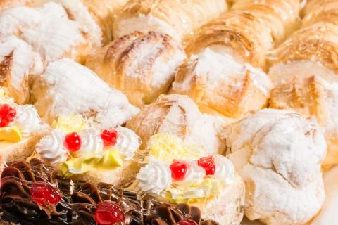Background of different desserts with cream Stock Photos
