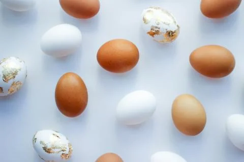 Background of different eggs on a white background. Fotos Stock