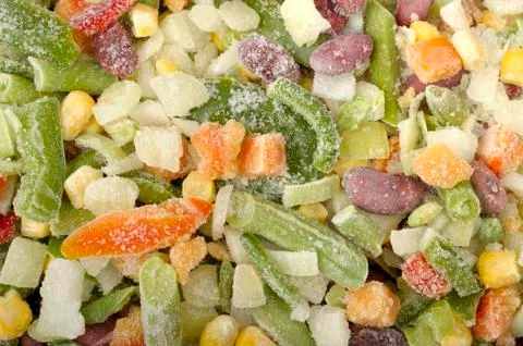 Background of different  frozen vegetables Stock Photos
