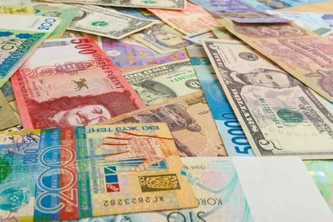 Background from different money banknotes from all over the world Stock Photos