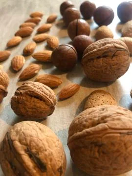 Background from different nuts on the table Stock Photos
