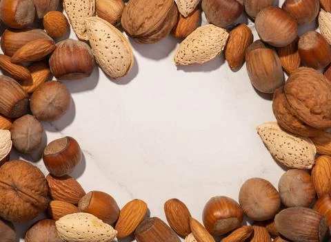 Background with different nuts on a white background Stock Photos