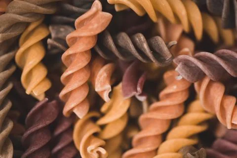 Background with different pasta closeup. Selective focus. Healthy lifestyle. Stock Photos