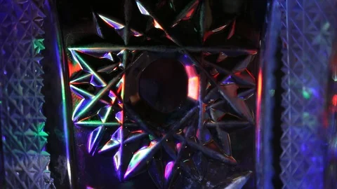 On the background with different patterns of twinkling multicolored rays Stock Footage 105941903