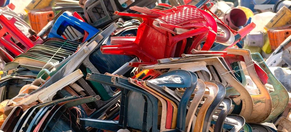 Background with different plastic chairs for separate garbage collection outd Stock Photos
