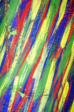 Background from different strokes of red, yellow, green and blue paint Stock Illustration