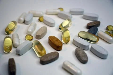 Background with Different supplements on a white background, concept of healt Stock Photos