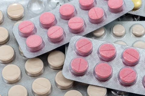 Background of different tablets in packaging close-up. Medicines. Health Foto stock