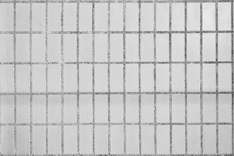 Background from dirty gray rectangular ceramic tiles 写真素材