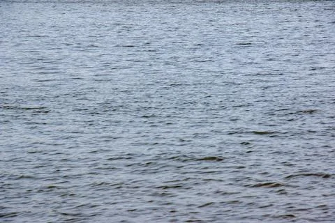 Background of the Dnieper River water surface with ripples. Natural color o.. Foto stock
