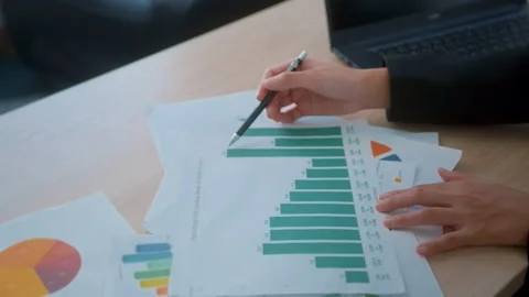 Background of documents with analytics data lying on table Stock Footage 205501465