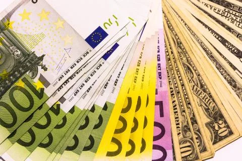 Background from dollar and euro different banknotes Stock Photos