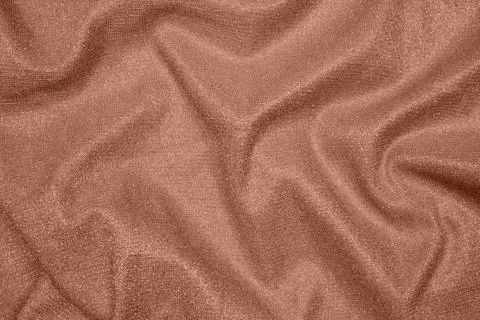 Background of draped mocha mousse brown fabric with lurex thread Stock Photos