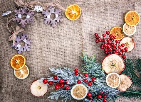 Background dried apple Orange burlap Stock Photos