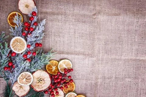 Background dried apple Orange burlap viburnum Stock Photos