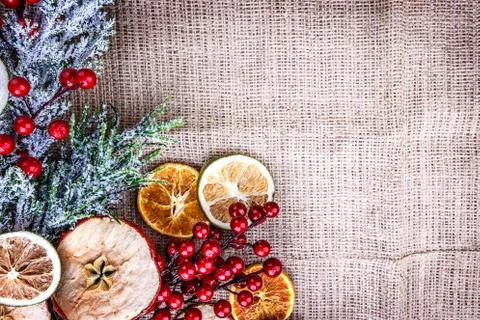 Background dried apple Orange burlap viburnum Stock Photos