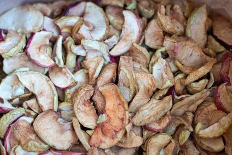 Background of dried apples in close-up. Texture of dried apples Stock Photos
