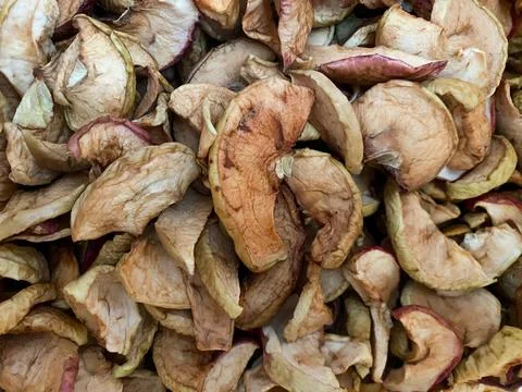 Background of dried apples in close-up. Texture of dried apples Stock Photos
