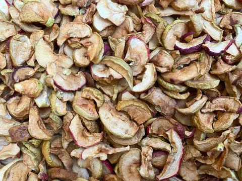 Background of dried apples in close-up. Texture of dried apples Stock Photos