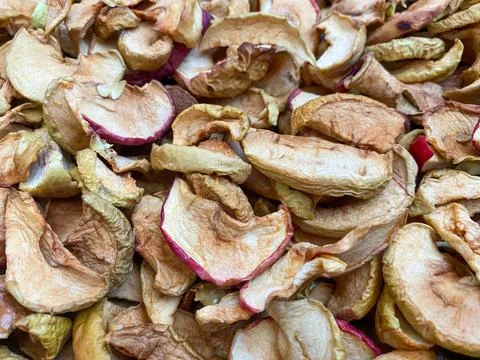 Background of dried apples in close-up. Texture of dried apples Stock Photos