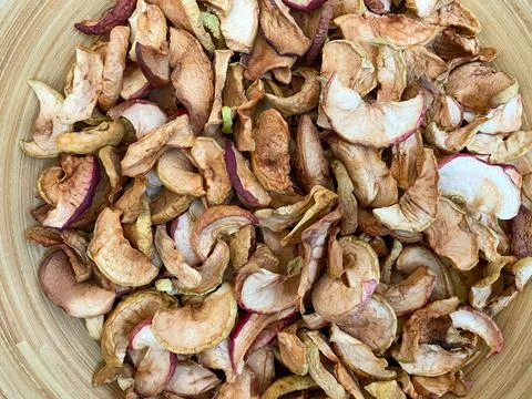 Background of dried apples in close-up. Texture of dried apples Stock Photos