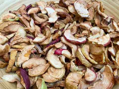 Background of dried apples in close-up. Texture of dried apples Stock Photos