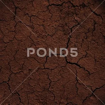 Background of dried brown coffee grounds cracked from the heat Stock Photos
