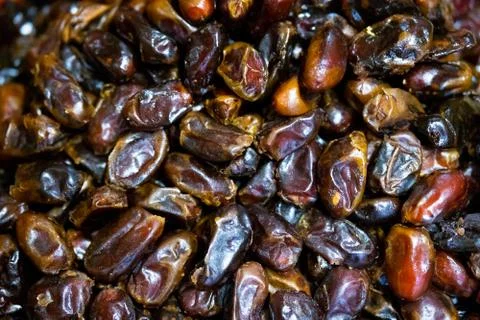 Background of dried dates fruit, at the open air market Stock Photos