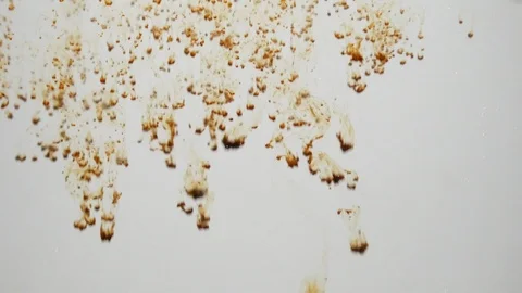 Background dropping coffee powder into the water splashing beautifully Stock Footage 100371479