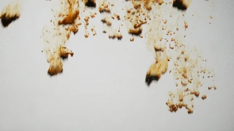 Background dropping coffee powder into the water splashing beautifully Stock Footage 100380075