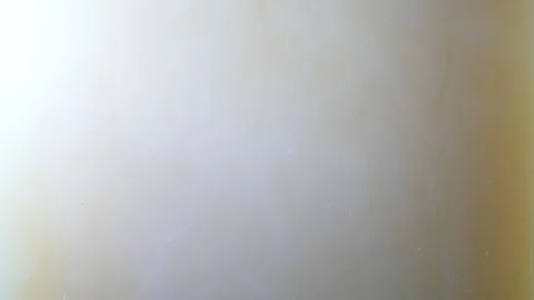 Background dropping coffee powder into the water splashing beautifully Stock Footage 102705445