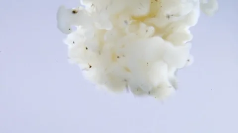 Background dropping coffee powder into the water splashing beautifully Stock Footage 102709674