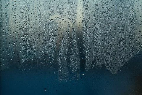 Background with drops on glass Stock Photos