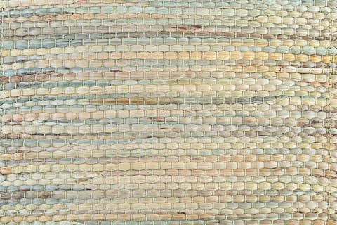 Background from dry and wicker seaweed. Wicker mat. Stock Photos