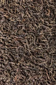 Background dry black tea Stock Photos