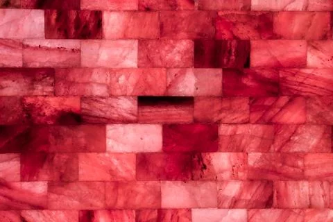 Background of dry salt cubes for salt therapy or halotherapy. Wall made of Stock Illustration
