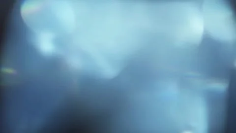 Background with the effect of glare of light. Light leaks from the lens flash Video stock 269140274