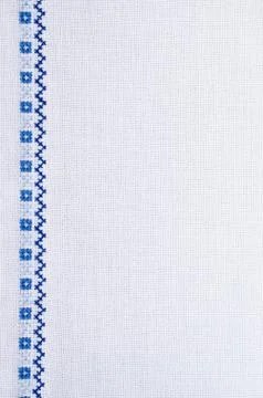 Background with embroidery texture. Stock Photos