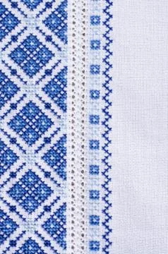 Background with embroidery texture. Stock Photos