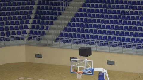 Background of empty seats and basketball hoop in a basketball arena Stock Footage 81803655
