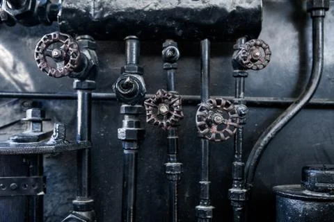 Background of engine room detail in a steam locomotive Stock Photos