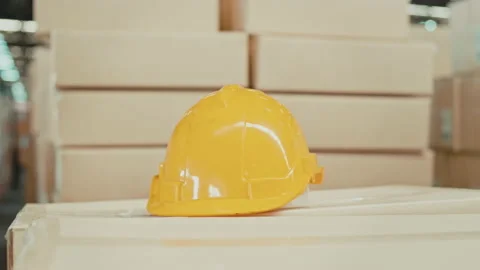 Background of engineering helmet in modern warehouse storage of retail shop Stock Footage 204918692