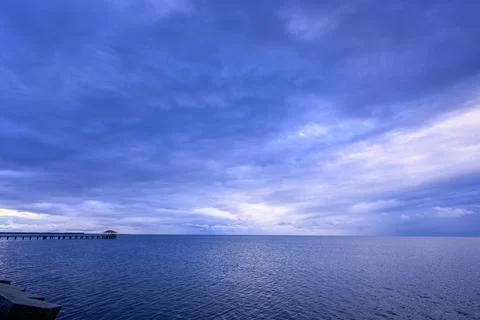 Background on evening clouds over the ocean, photography, wide angle, copy sp Stock Photos