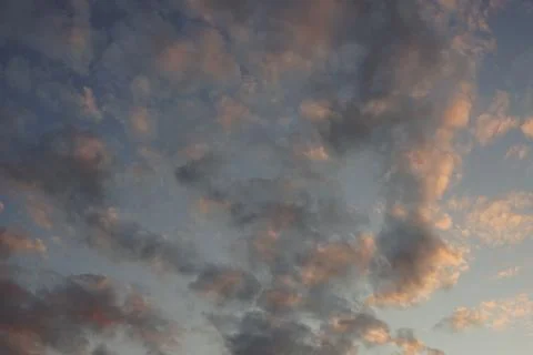 Background evening cloudy sky in summer sunset 写真素材