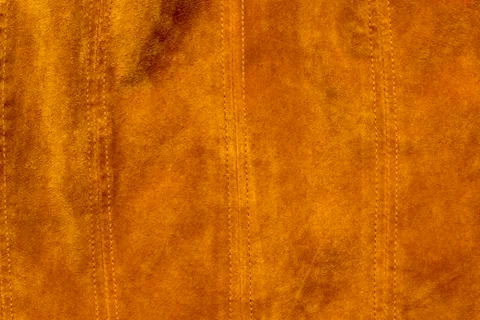 Background with fabric in brown suede Stock Photos